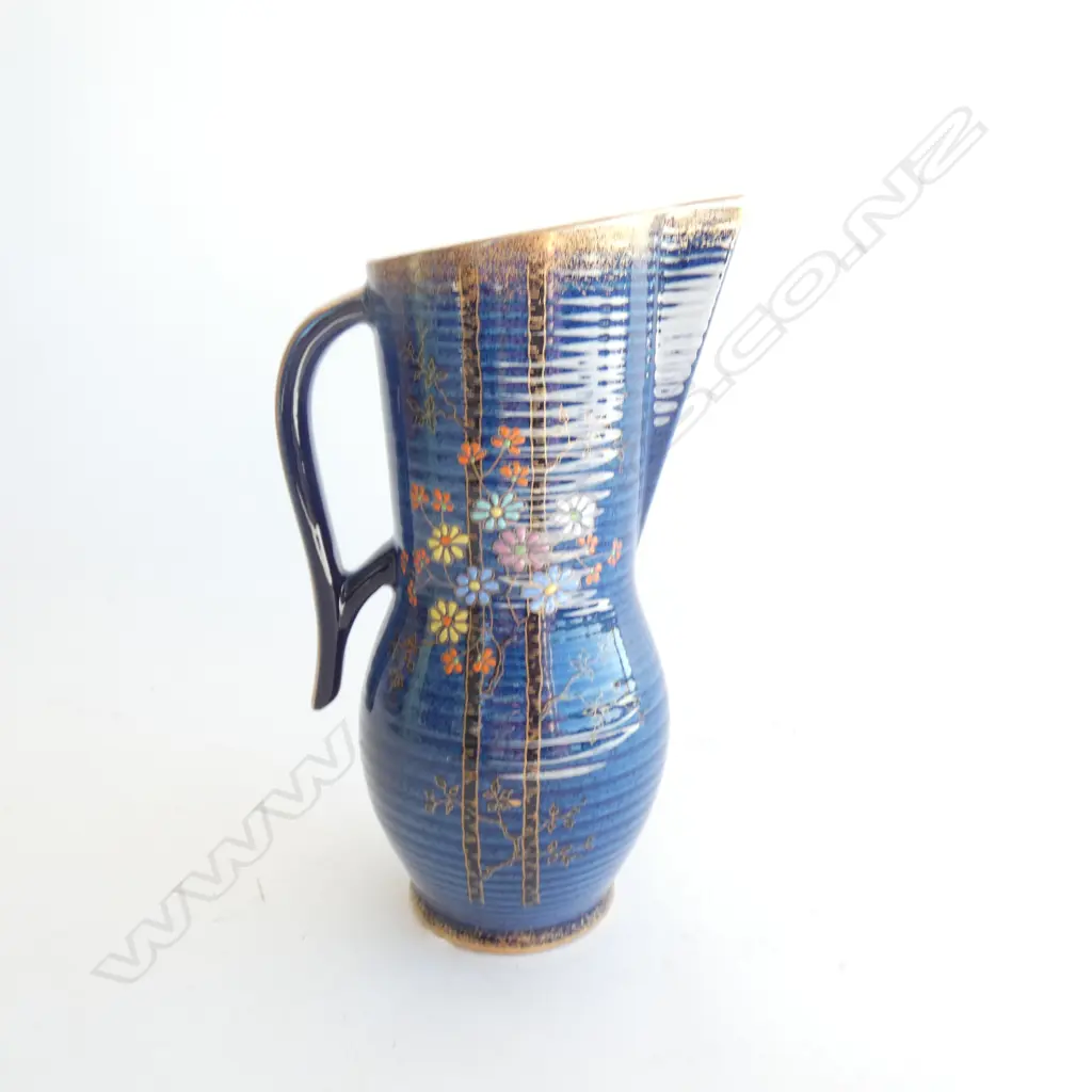 A Crown Devon blue royale ewer vase. Image 1++